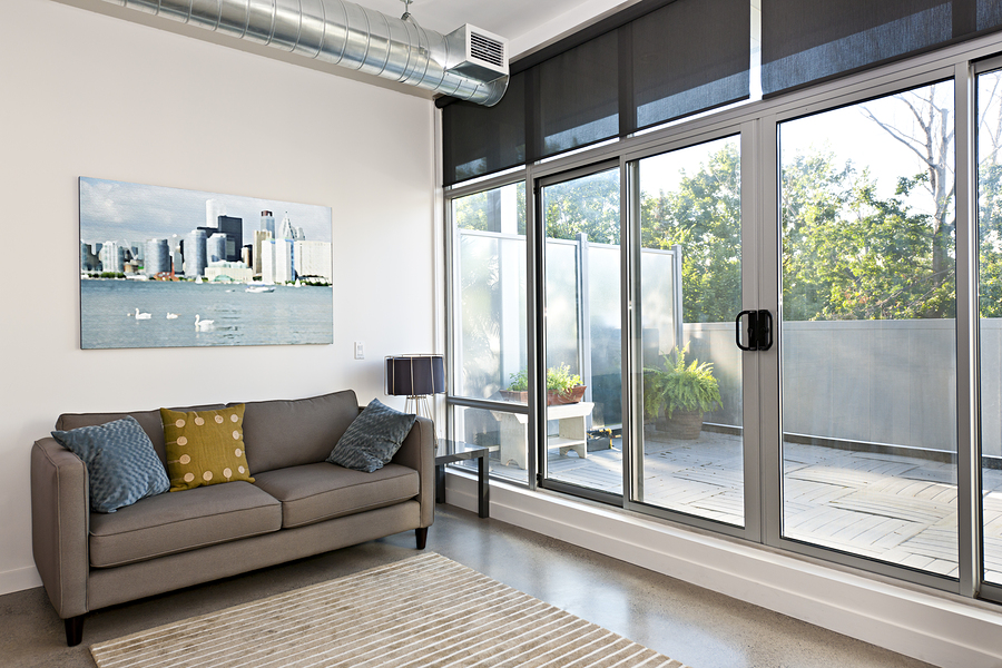 Living room with sliding glass door to balcony